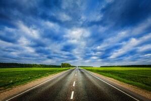 Road and stormy sky photo