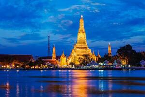 Wat Arun temple in Bangkok, Thailand in the night photo