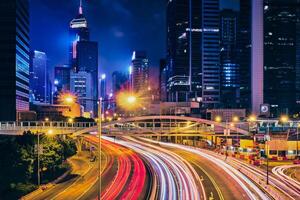 Street traffic in Hong Kong at night photo