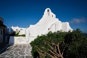 griego ortodoxo Iglesia de panagia paraportiani en pueblo de chora en mykonos isla foto