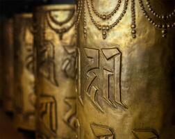 Buddhist prayer wheels photo