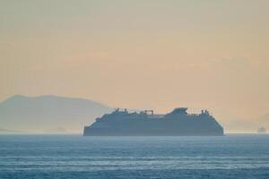 Cruise liner ship in Mediterranea sea photo