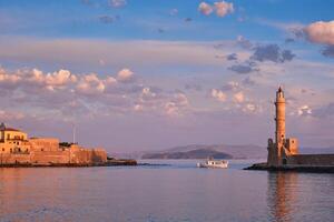 Boat in picturesque old port of Chania, Crete island. Greece photo