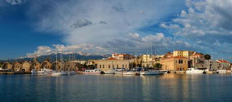 Yachts and boats in picturesque old port of Chania, Crete island. Greece photo