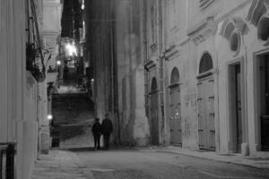 Narrow street at night photo