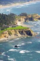 Condominiums spread across headlands at Otter Rock photo
