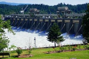 Water spills through the turbines of the  Bonneville Dam photo