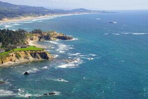 Condominiums spread across headlands at Otter Rock photo
