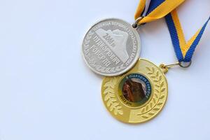 KYIV, UKRAINE - MAY 4, 2022 Medal for the person who conquered Mount Hoverla photo