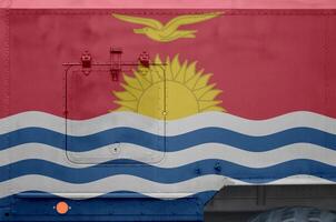 Kiribati flag depicted on side part of military armored truck closeup. Army forces conceptual background photo