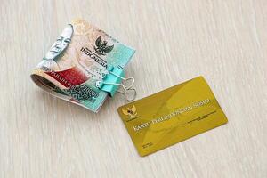 Indonesian golden social security card originally called Kartu perlindungan sosial photo