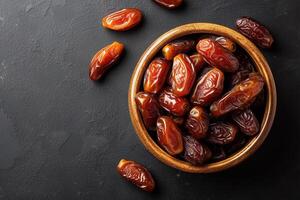 AI generated Dry date in a bowl on a black background photo