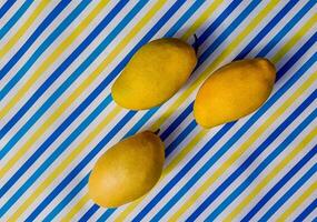 Tropical Mango Delight on Striped Background photo