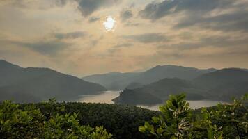 Serene Mountain Valley Sunrise Panorama photo