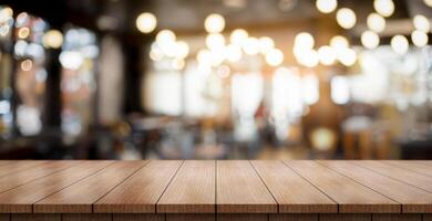 AI generated Empty wooden table top with lights bokeh on blur restaurant background. photo