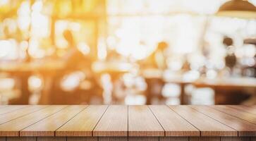AI generated Empty wooden table top with lights bokeh on blur restaurant background photo