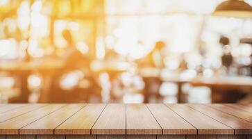 ai generado vacío de madera mesa parte superior con luces bokeh en difuminar restaurante antecedentes foto