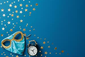 AI generated Sleeping Masks, Golden Stars and Alarm Clock on Blue Background photo