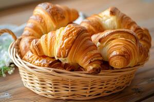 AI generated Freshly baked croissants in a basket on a wooden table photo