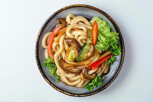 AI generated Udon served on a plate isolated on a white background photo