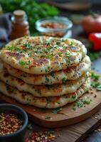 AI generated Homemade Indian naan bread with parsley and red pepper on wooden board photo