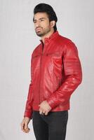 handsome pakistani young man in red biker leather jacket on white background, closeup, full height, smiling poses photo
