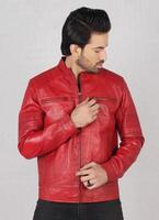 handsome pakistani young man in red biker leather jacket on white background, closeup, full height, smiling poses photo