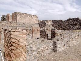 Pompeii, the ancient Roman city buried by the eruption of Mount Vesuvius, stands as a UNESCO World Heritage Site, offering a unique glimpse into daily life during the Roman Empire. photo