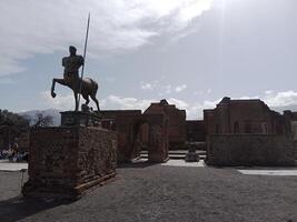 Pompeii, the ancient Roman city buried by the eruption of Mount Vesuvius, stands as a UNESCO World Heritage Site, offering a unique glimpse into daily life during the Roman Empire. photo