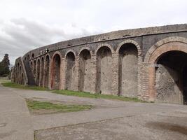 Pompeii, the ancient Roman city buried by the eruption of Mount Vesuvius, stands as a UNESCO World Heritage Site, offering a unique glimpse into daily life during the Roman Empire. photo