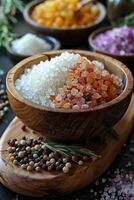 AI generated Wooden bowl filled with salt and wooden spoon surrounded by other bowls and spices photo