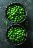 AI generated Green peas in bowl on dark background photo