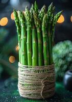 AI generated Fresh green asparagus on dark background photo