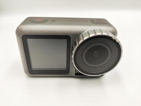 High Performance Action Camera on White Background Versatile Device for Capturing Dynamic Shots in Any Environment photo