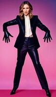 AI generated photo of middle aged woman with leather suit jacket and hand gloves standing against pink background, generative AI