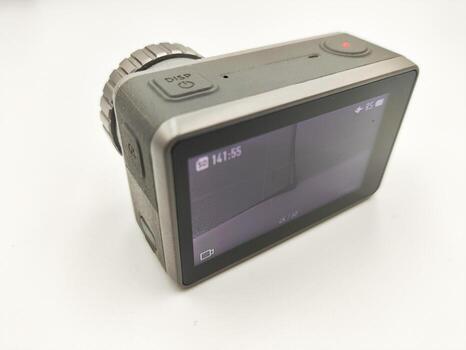 High Performance Action Camera on White Background Versatile Device for Capturing Dynamic Shots in Any Environment photo