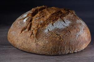 freshly prepared homemade bread on a wooden table 5 photo