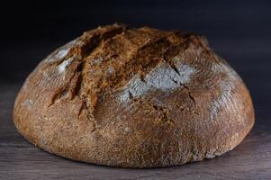 freshly prepared homemade bread on a wooden table 4 photo