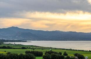 clouds sunset over the mountains and the Mediterranean sea in Cyprus 12 photo