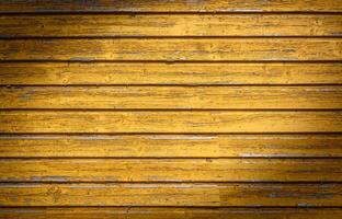 un afligido granero madera fondo exhibiendo resistido, afligido tablones y nostálgico rústico encanto. foto