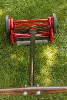 a full view of a reel lawnmower after the restoration process was completed photo
