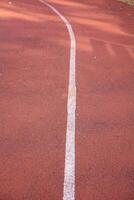 Beautiful jogging track in the park outdoors photo