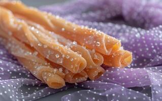 AI generated Purple Fabric Hosting Pretzels Adorned with Sugar Crystals photo