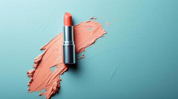 AI generated Beautiful peach-colored lipstick in a sleek silver tube with a vibrant smear on a blue background photo