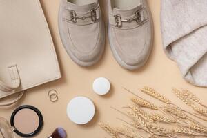Flat lay women's shoes, bag and cosmetics. Shopping, fashion blog, sales concept photo