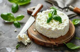 AI generated Fresh Homemade Ricotta Cheese with Basil on Wooden Board for Culinary and Recipe Content photo