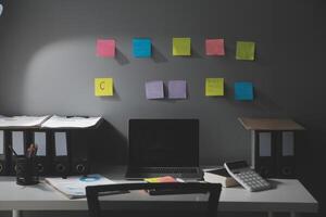 Studio workspace with laptop computer and office supplies. Work from home. With copy space photo