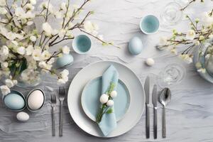 AI Generated Blue and White Plates and Silverware on Table photo