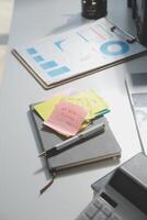 Studio workspace with laptop computer and office supplies. Work from home. With copy space photo
