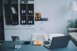 Woman is working in the office. Concept of small business. photo